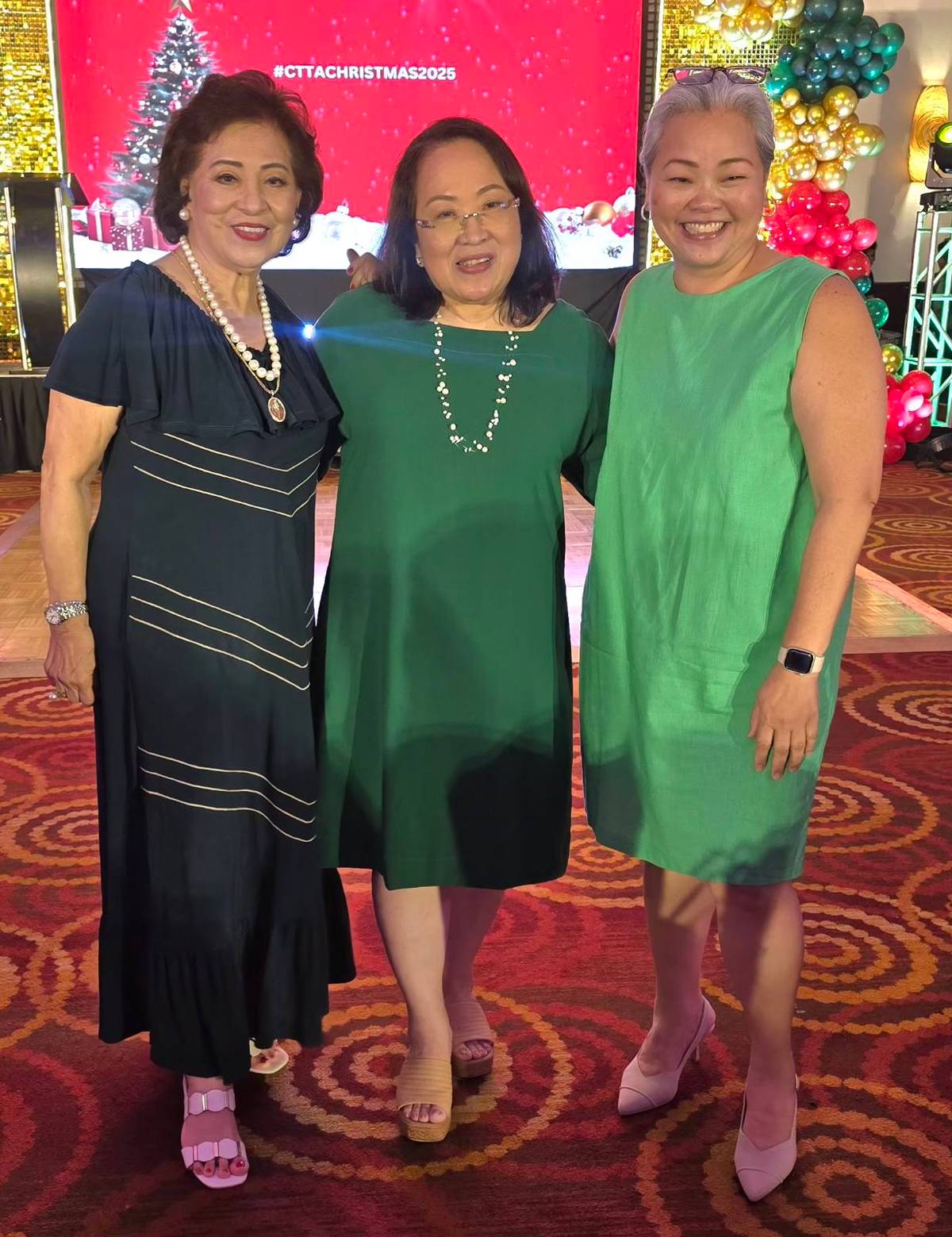 TRAVEL specialists Aida Uy, Baby Dy and Joan Tiu.