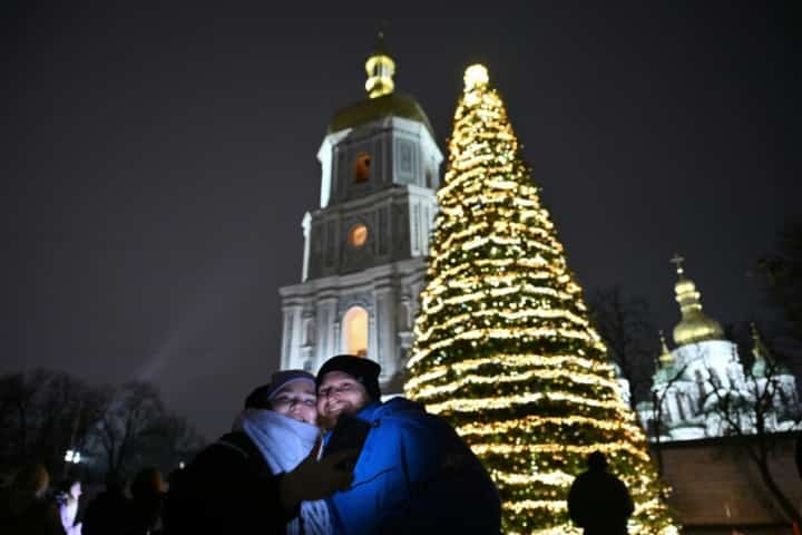 Kyiv’s wartime Christmas showcases city’s ‘split’ reality