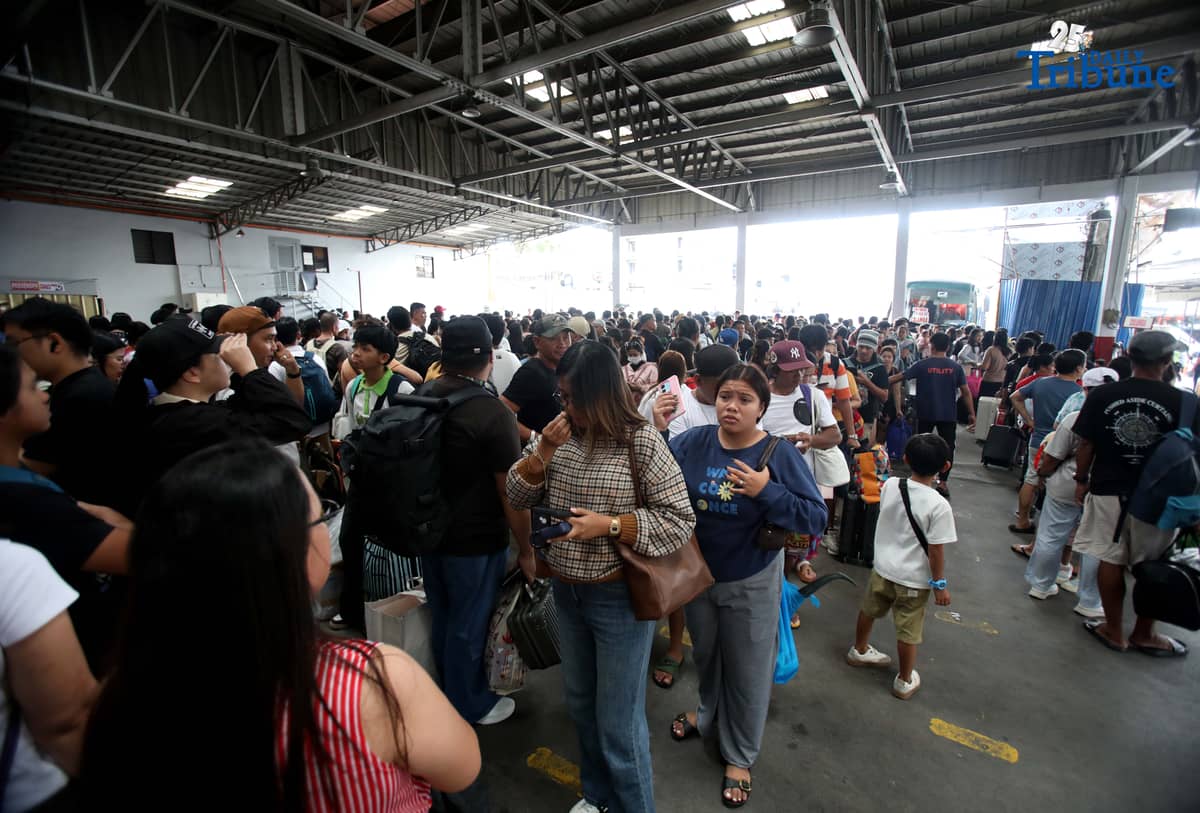 Passengers bound for their home provinces for the New Year were seen flocking to the JAC bus terminal in Quezon City on Friday, December 26, 2025.