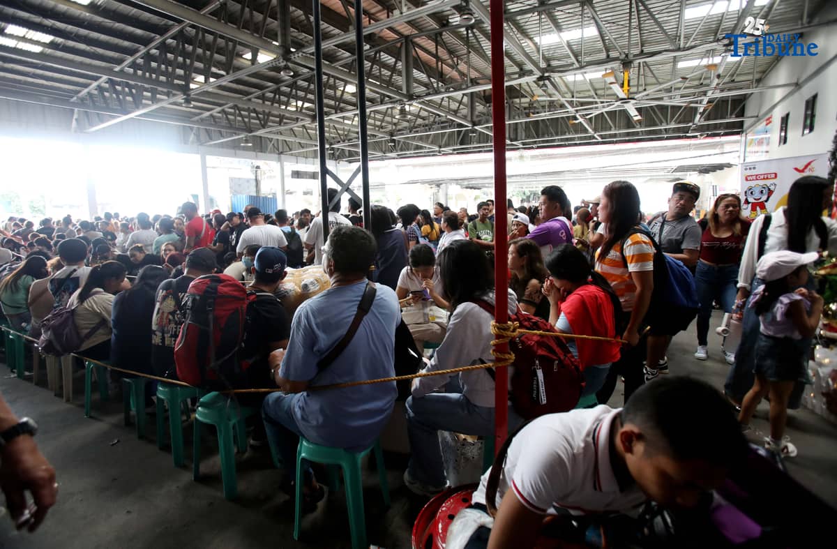 Passengers bound for their home provinces for the New Year were seen flocking to the JAC bus terminal in Quezon City on Friday, December 26, 2025.