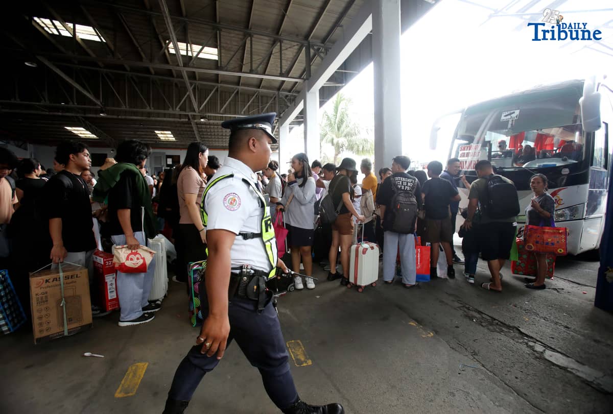Passengers bound for their home provinces for the New Year were seen flocking to the JAC bus terminal in Quezon City on Friday, December 26, 2025.