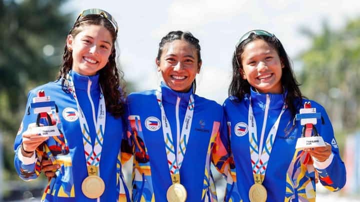 KIM Mangrobang (center) celebrates with Kira Ellis and Raven Faith Alcoseba after winning the gold medal in the women’s team relay event of the 33rd Southeast Asian Games.