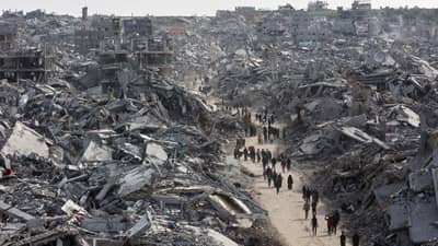 (FILES) This aerial view shows displaced Palestinians returning to the war-devastated Jabalia refugee camp in the northern Gaza Strip on January 19, 2025, shortly before a ceasefire deal in the war between Israel and the Palestinian militant group Hamas was implemented.