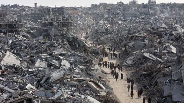 (FILES) This aerial view shows displaced Palestinians returning to the war-devastated Jabalia refugee camp in the northern Gaza Strip on January 19, 2025, shortly before a ceasefire deal in the war between Israel and the Palestinian militant group Hamas was implemented.