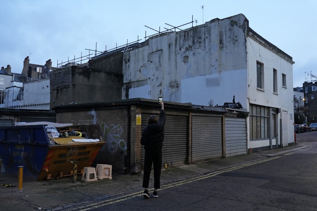 UK's street artist Banksy unveils latest mural in London
