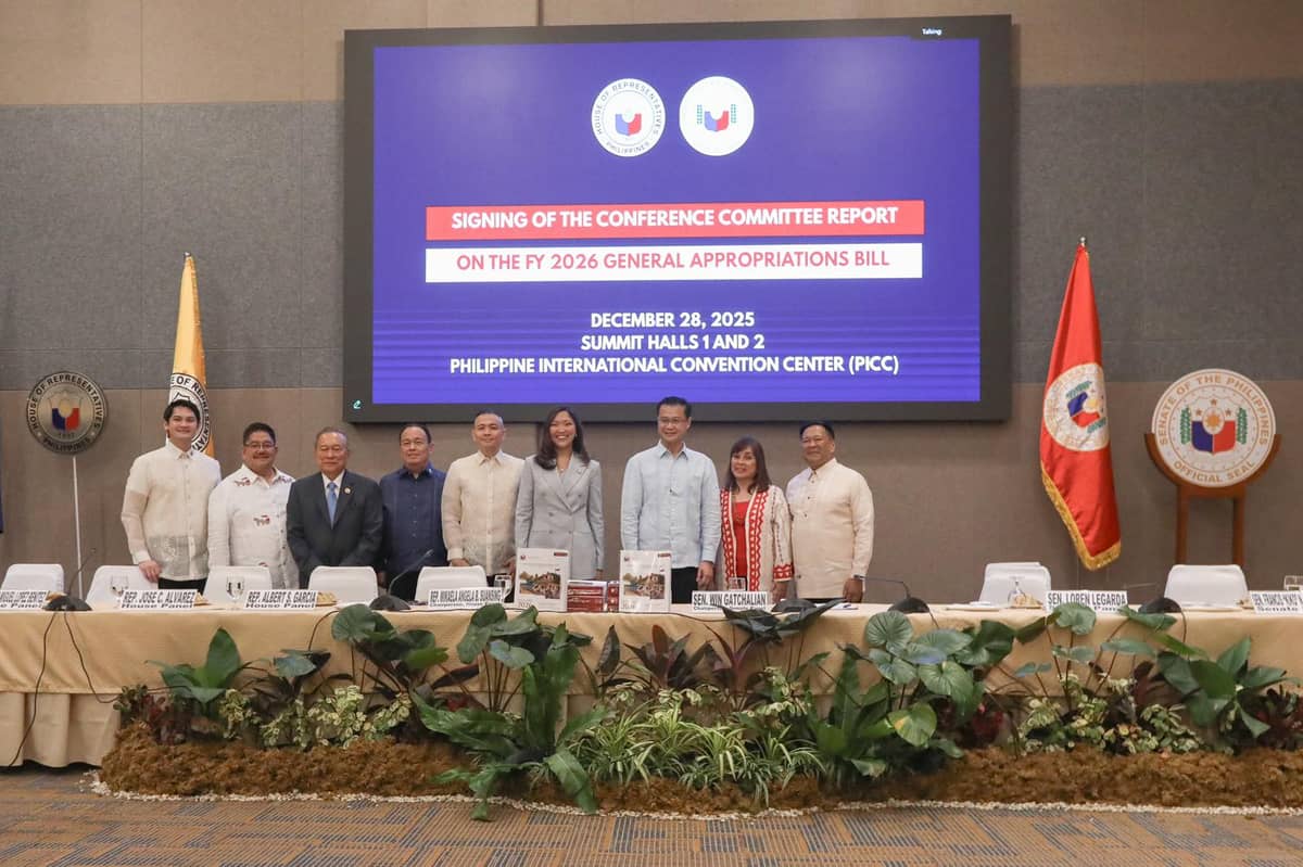 Lawmakers from the House of Representatives and the Senate of the Philippines—namely (L–R) Representatives Allan Ty, Marcelino Libanan, Jesus Romualdo, Javier Lopez Benitez, Jose Alvarez, Albert Garcia; House Committee on Appropriations Chairperson Mikaela Suansing; Senate Committee on Finance Chairperson Sherwin Gatchalian; and Senators Loren Legarda, Francis “Kiko” Pangilinan, and JV Ejercito—sign the bicameral committee report on the General Appropriations Bill for fiscal year 2026 at the Philippine International Convention Center in Pasay City on Sunday, Dec. 28, 2025. The bill is set for ratification. | Aram Lascano, SPPA Pool