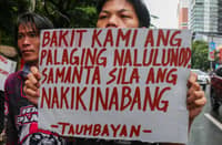 Activists stage a protest rally at Mendiola in Manila to denounce the corruption scandal surrounding the DPWH flood control projects.
