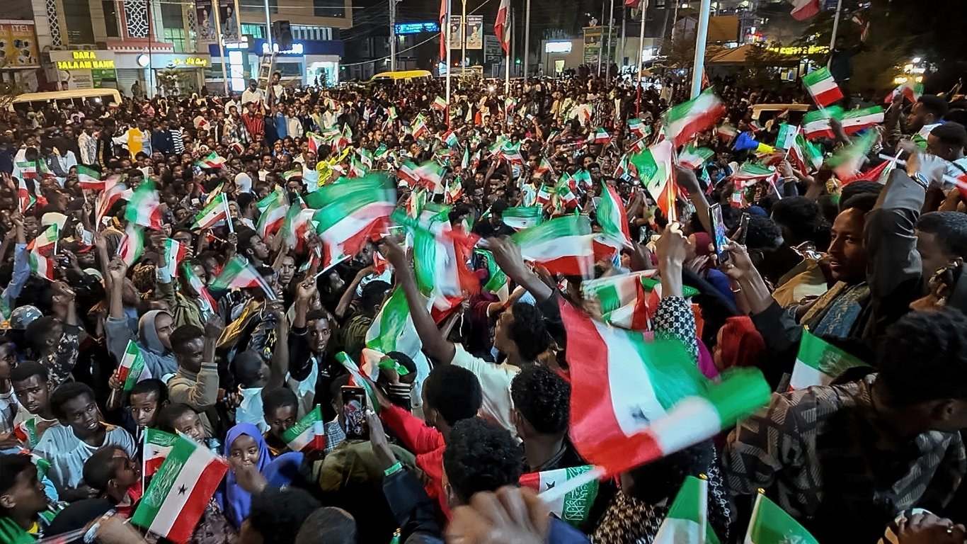 RESIDENTS wave Somaliland flags as they gather to celebrate Israel’s announcement recognizing its statehood in downtown Hargeisa, on 26 December 2025.