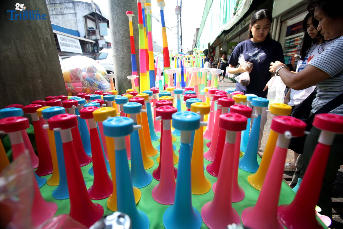 (December 30 2025) A vendor arrange and assist her customer buying party horn or Torotot a safe alternative noise makers for new year celebration, at Mega-Qmart in Quezon City. Photo/Analy Labor