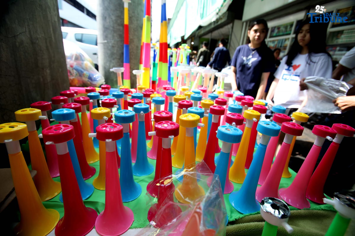 (December 30 2025) A vendor arrange and assist her customer buying party horn or Torotot a safe alternative noise makers for new year celebration, at Mega-Qmart in Quezon City. Photo/Analy Labor