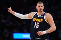 Nikola Jokic #15 of the Denver Nuggets calls a play against the Miami Heat during the second quarter at Kaseya Center on December 29, 2025 in Miami, Florida.