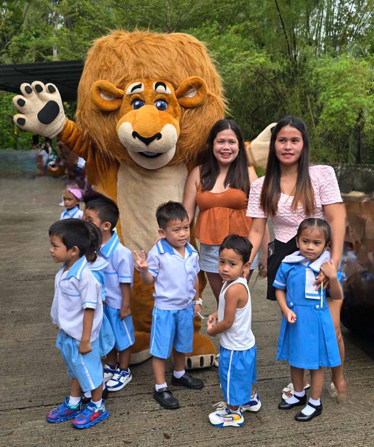 BIG smiles and a friendly lion.