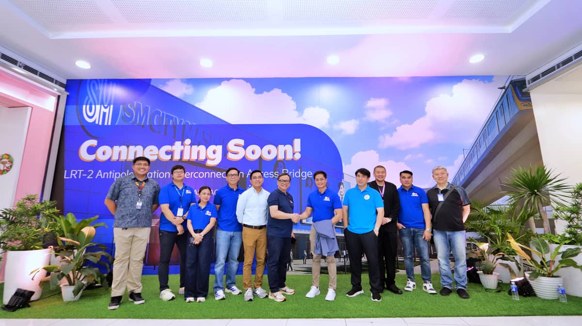 SM Executives and lRTA Officials pose for commemorative photo at the soon-to-open interconnection access bridge at SM City Masinag.