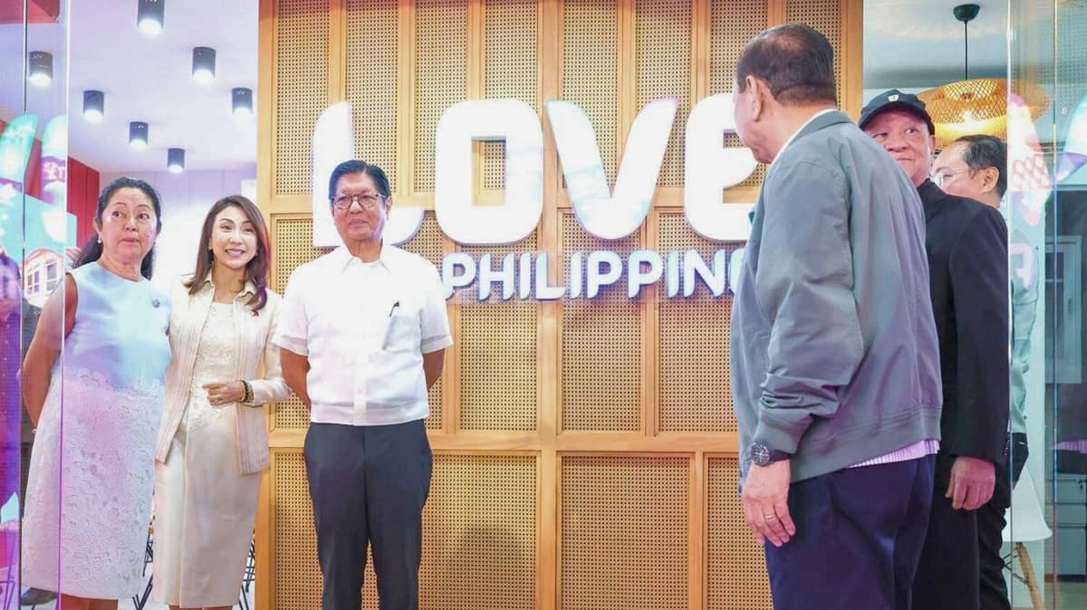 THE First Couple and Tourism Secretary Christina Frasco share a light moment during the inauguration.
