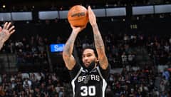 Champagnie drops 11 treys, powers Spurs