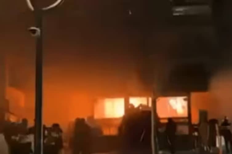 MOBILE phone camera captures the Swiss resort blaze in the early hours of 01 January 2026.