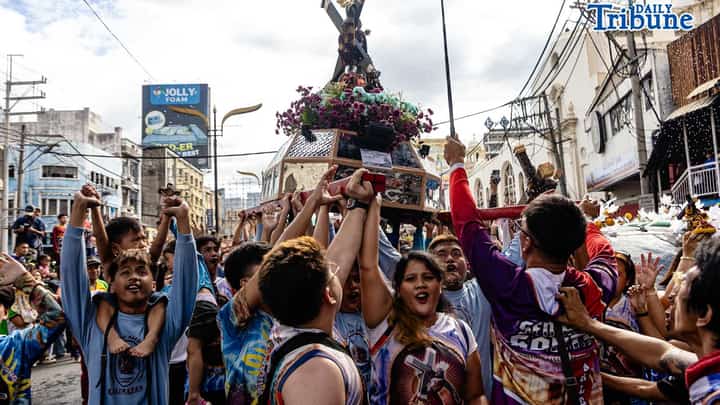 Blessed in passing Along Quezon Boulevard, Catholic devotees lift replicas of the Black Nazarene on Saturday as priests sprinkle holy water, a quiet rehearsal of faith outside Quiapo Church ahead of the Traslacion on 9 January 2026.