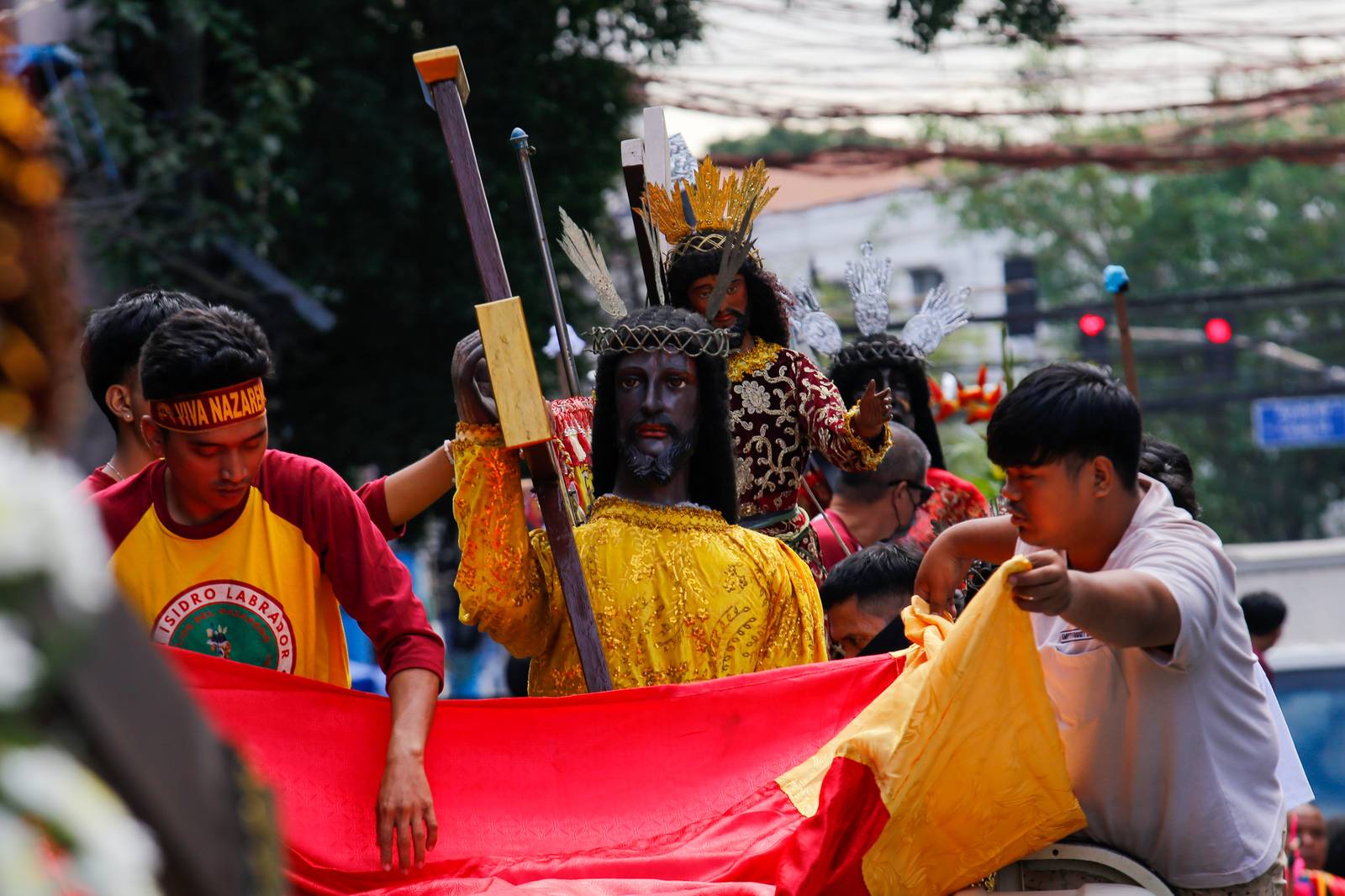 Catholic devotees start lining up with their replica of Jesus Nazareno along designated streets in Quiapo, Manila, on the morning of 03 January 2025. The blessing of the replica, which will take place in the afternoon, is expected to draw thousands of devotees.