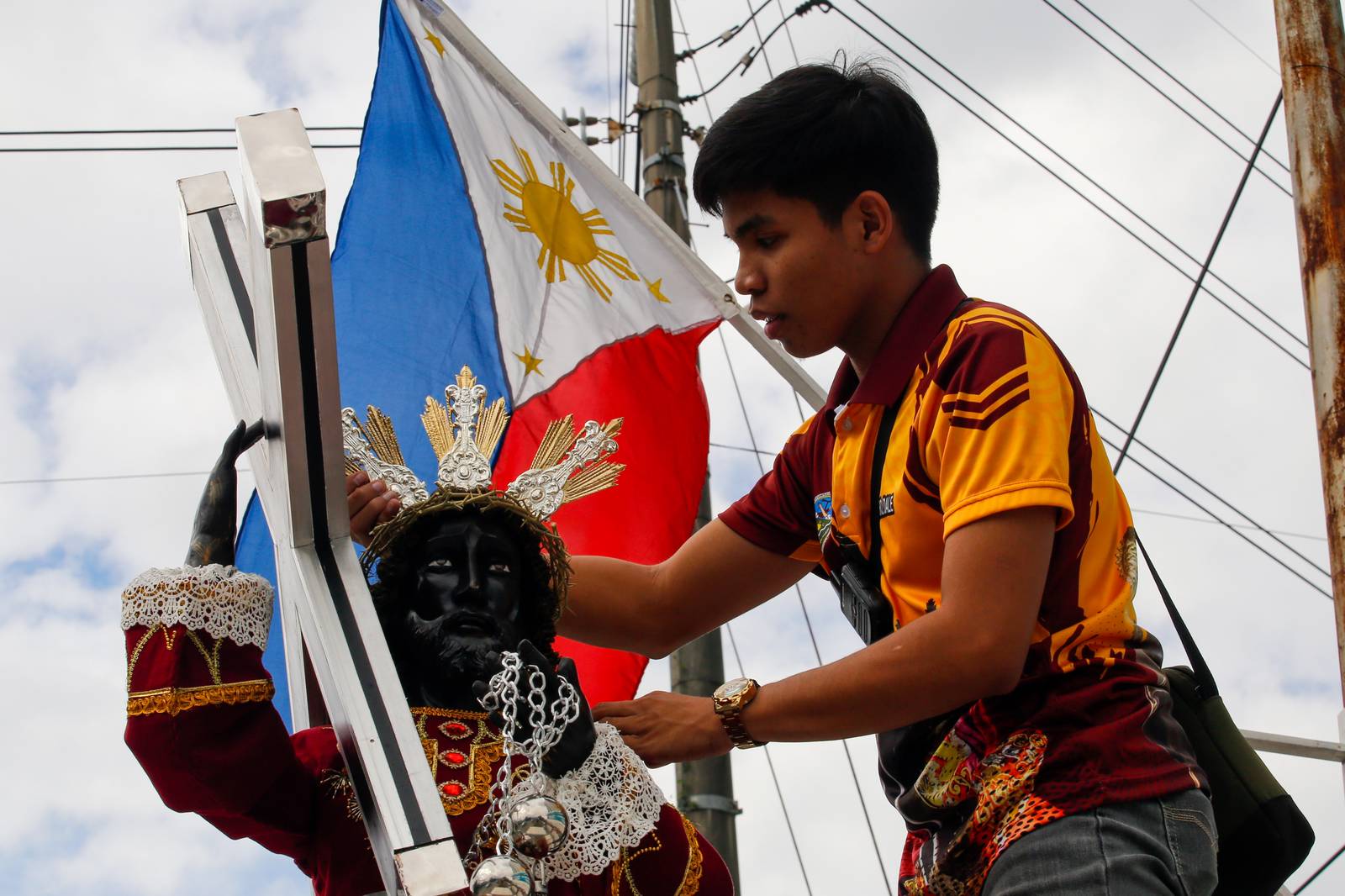 Catholic devotees start lining up with their replica of Jesus Nazareno along designated streets in Quiapo, Manila, on the morning of 03 January 2025. The blessing of the replica, which will take place in the afternoon, is expected to draw thousands of devotees.