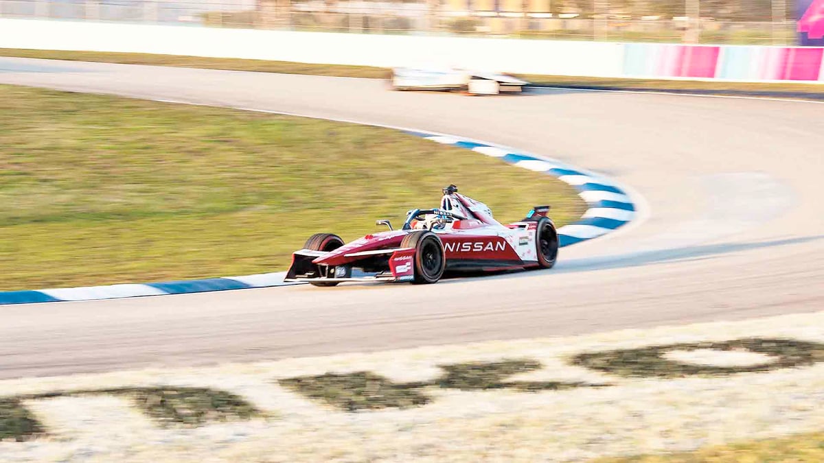 NISSAN Formula E car exits a corner during a championship round as the team continues its all-electric racing campaign alongside its sustainability program.