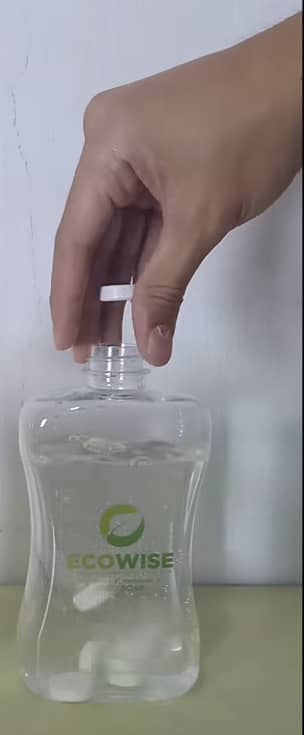 DAN Cruz shows his tablet dishwashing soap. The tablets dissolve into liquid dishwashing soap when mixed with water in a refillable plastic bottle.