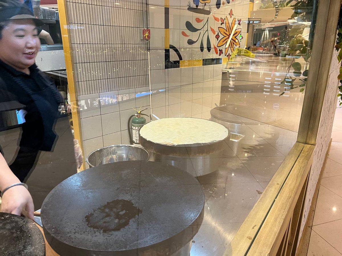The crêpes are thin and cooked on a billig, a flat cast-iron griddle, at very specific temperatures.