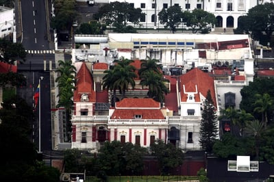 Shots fired near Venezuela presidential palace: witnesses