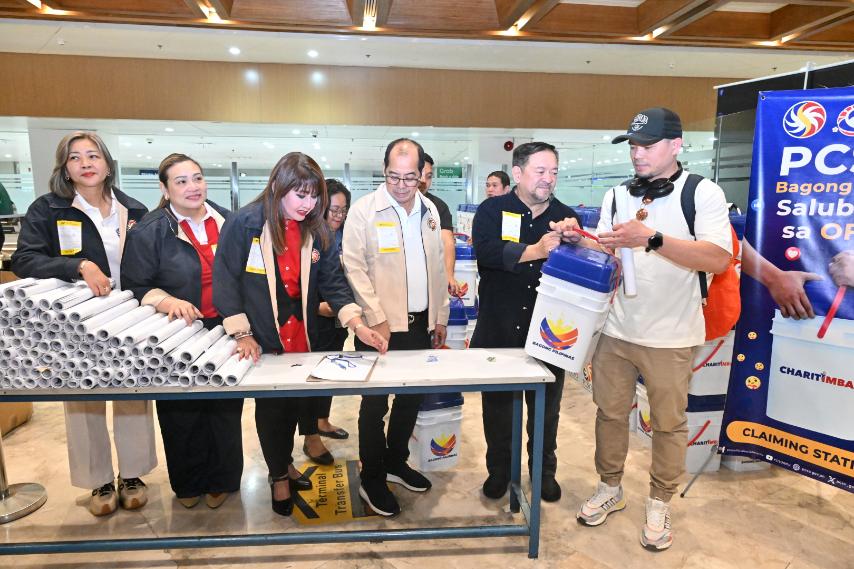 312 OFWs from Kuwait welcomed home