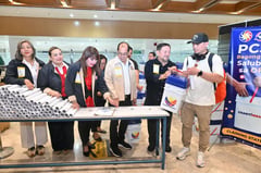 312 OFWs from Kuwait welcomed home