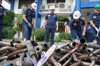 Pampanga police dispose of illegal fireworks, mufflers