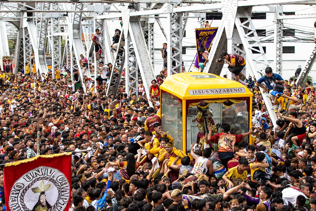 A crowd estimate by late afternoon Friday of over 600,000 Catholic devotees is seen to have filled the streets of Manila for the procession of the carriage or andas carrying the image of the Black Nazarene during the annual religious procession or Traslacion on 9 January.