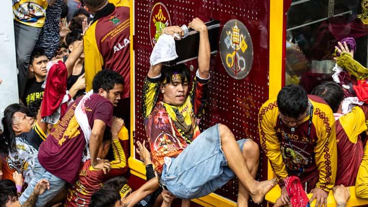 A crowd estimate by late afternoon Friday of over 600,000 Catholic devotees is seen to have filled the streets of Manila for the procession of the carriage or andas carrying the image of the Black Nazarene during the annual religious procession or Traslacion on 9 January.