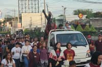 AROUND 200 devotees joined the two-hour procession in Matina, carrying the replica of the Poong Nazareno through Barangay Matina Crossing to Matina Aplaya and back.