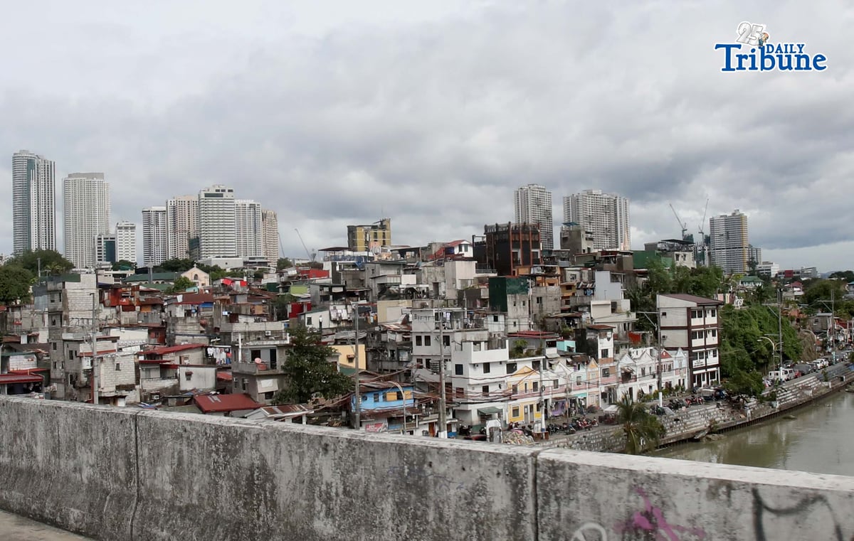 ECONOMIC OUTLOOK
Buildings tower over a low-rise residential area in Pasig City. The United Nations said that as the country rebounds from a corruption scandal, the Philippine economy may expand at a faster pace this year and in 2027, supported by household consumption and easing inflation. In its latest World Economic Situation and Prospects report, the UN projected Philippine gross domestic product growth at 5.7 percent this year and 6.1 percent in 2027.