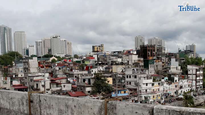 ECONOMIC OUTLOOK
Buildings tower over a low-rise residential area in Pasig City. The United Nations said that as the country rebounds from a corruption scandal, the Philippine economy may expand at a faster pace this year and in 2027, supported by household consumption and easing inflation. In its latest World Economic Situation and Prospects report, the UN projected Philippine gross domestic product growth at 5.7 percent this year and 6.1 percent in 2027.