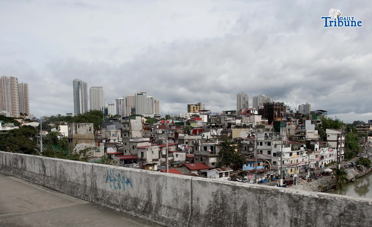 ECONOMIC OUTLOOK
Buildings tower over a low-rise residential area in Pasig City. The United Nations said that as the country rebounds from a corruption scandal, the Philippine economy may expand at a faster pace this year and in 2027, supported by household consumption and easing inflation. In its latest World Economic Situation and Prospects report, the UN projected Philippine gross domestic product growth at 5.7 percent this year and 6.1 percent in 2027.