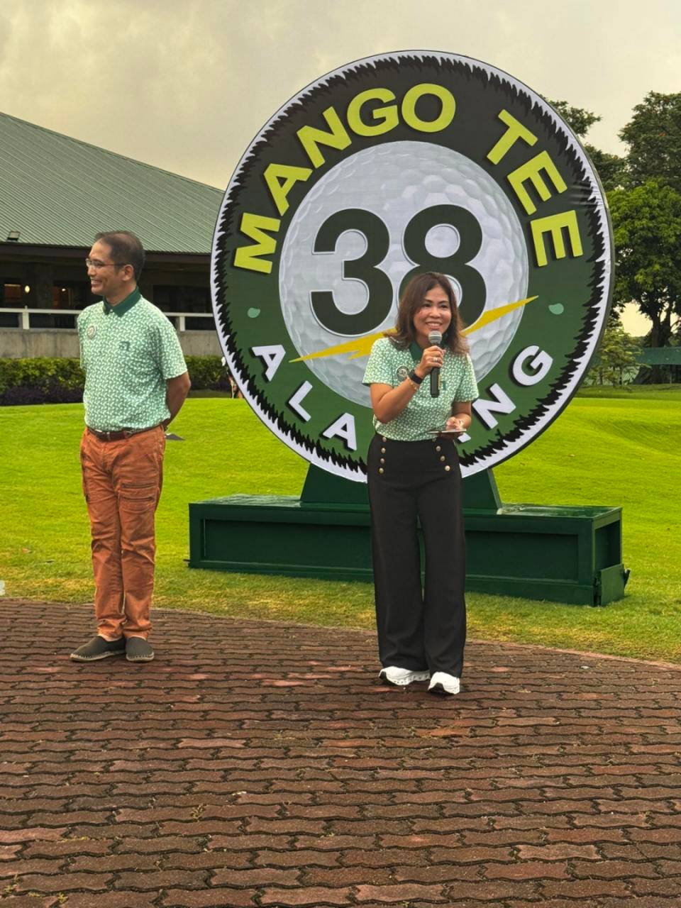 SARAH MEDINA, shown here with Randy Nonato, is the first woman to chair the Mango Tee organizing committee.