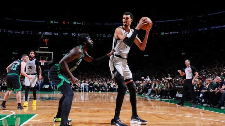 Victor Wembanyama #1 of the San Antonio Spurs handles the ball during the game against the Boston Celtics on January 10, 2026 at TD Garden in Boston, Massachusetts.