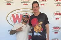 WBO and WBA champion Oscar Collazo (left) and American boxing man Sean Gibbons pose during a WBO event over the weekend in Puerto Rico.