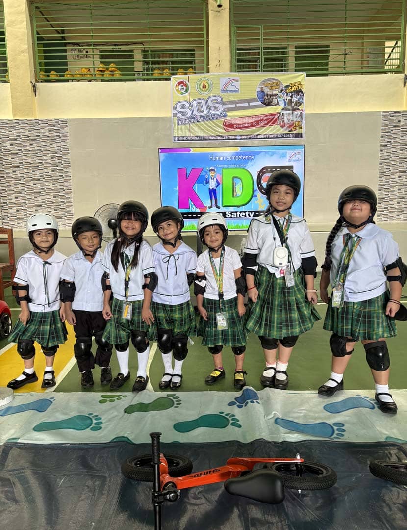 CHILDREN wear helmets and protective gear during the Kids on Safety activity conducted by the Honda Safety Driving Center.