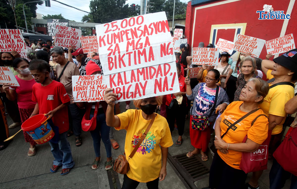 (January 12 2026) To Demand ₱25,000 Compensation for the disaster survivors, militant group  hold a protest in front of the DSWD Central Office in Batasan, Quezon City on Monday January 12 2026, calling for the immediate release of ₱25,000 compensation per affected family. Photo/Analy Labor