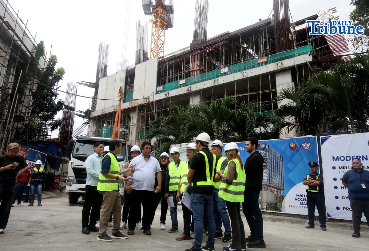 Dizon inspects new cancer hospital