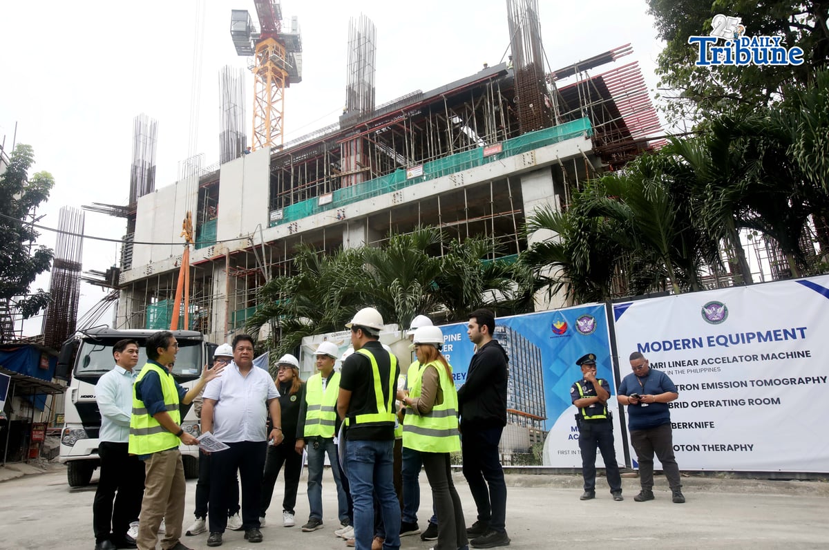 Department of Public Works and Highways (DPWH) Secretary Vince Dizon inspects the ongoing construction of Philippine Cancer Center 20-storey hospital building, in Quezon City, on Tuesday, 13 January 2026