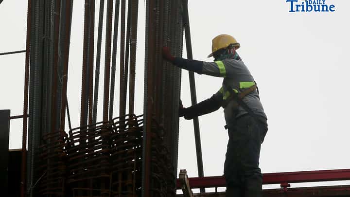 Construction workers were seen busy at the ongoing 20 storey constructed Philippine Cancer Center hospital building in Quezon City, on Tuesday, January 13, 2026
