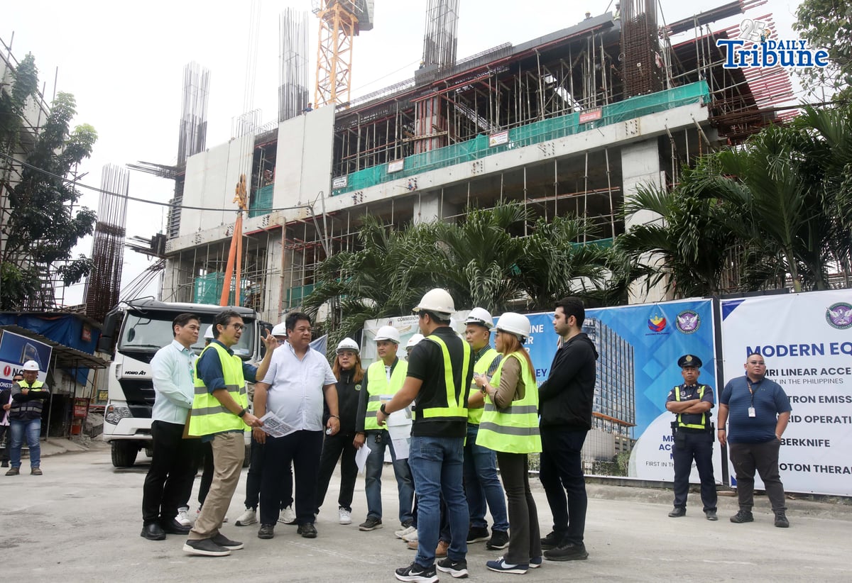 Department of Public Works and Highways (DPWH) Secretary Vince Dizon inspects the ongoing construction of Philippine Cancer Center 20-storey hospital building, in Quezon City, on Tuesday, 13 January 2026