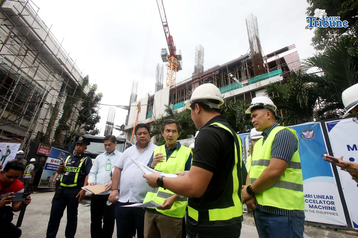 Department of Public Works and Highways (DPWH) Secretary Vince Dizon inspects the ongoing construction of Philippine Cancer Center 20-storey hospital building, in Quezon City, on Tuesday, 13 January 2026