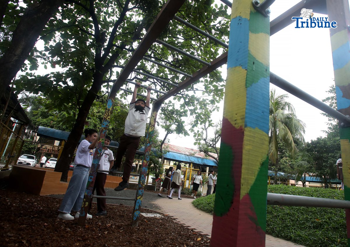 (January 13 2026) Students at Diosdado Macapagal Elementary School in Quezon City, enjoy playing at the newly opened OASIS Schoolyard, During the launching of OASIS Schoolyard on Tuesday, January 13, 2026, the Quezon City Government project in partnership with the Resilient Cities Network (R-Cities) and the Temasek Foundation, is aims to transform public school grounds into cooler, greener, and more climate-resilient spaces to protect students from extreme heat, flooding, and other climate risks. Photo/Analy Labor