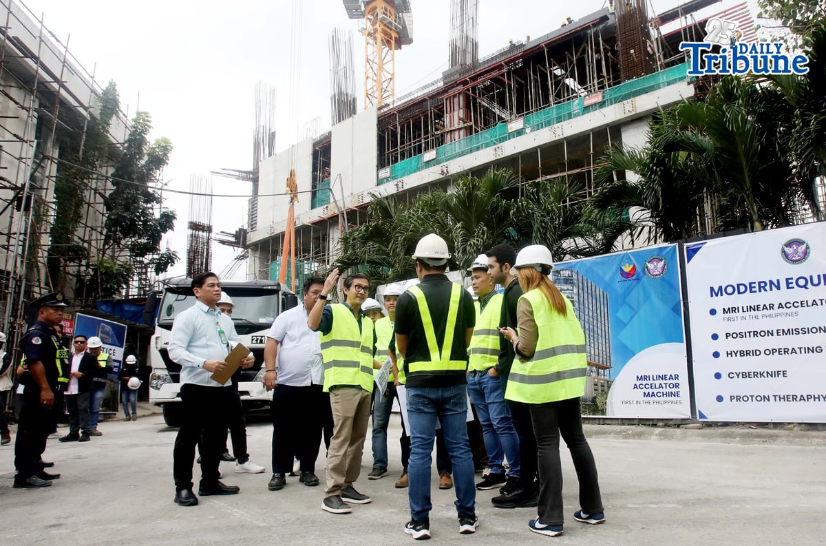 Department of Public Works and Highways (DPWH) Secretary Vince Dizon inspects the ongoing construction of Philippine Cancer Center 20-storey hospital building, in Quezon City, on Tuesday, 13 January 2026