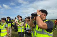 PARTICIPANTS in an airport safety training exercise.