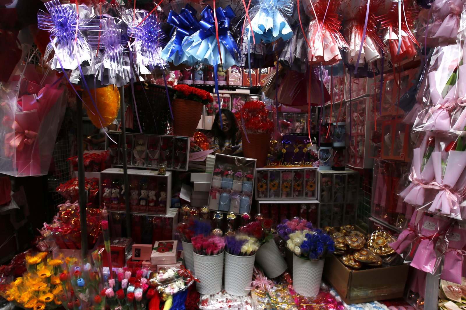 Valentine's Day is in the air for sidewalk vendors in Divisoria, Manila, on 15 January 2025, as they start selling plastic flowers, cards, plushies, gift items, and other novelty products. Gift items can go as low as 10 pesos and as high as 350 pesos.